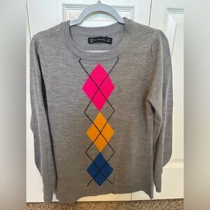 Gray sweater with argyle design